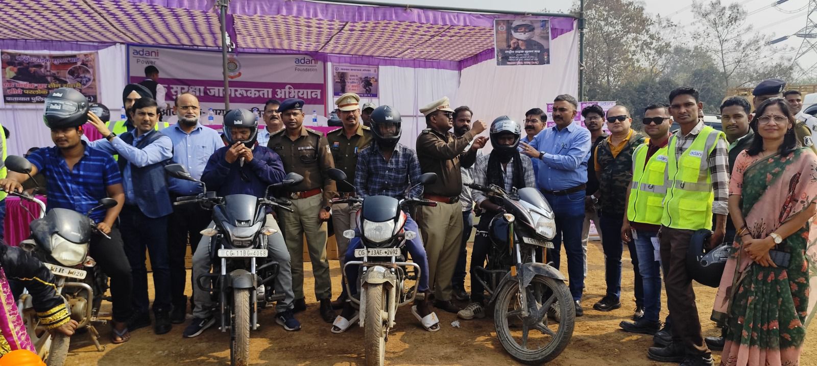 Adani Power takes a major initiative towards road safety, distributing helmets to over 100 drivers in Chikhli, Raigarh, Chhattisgarh. - Khabargali