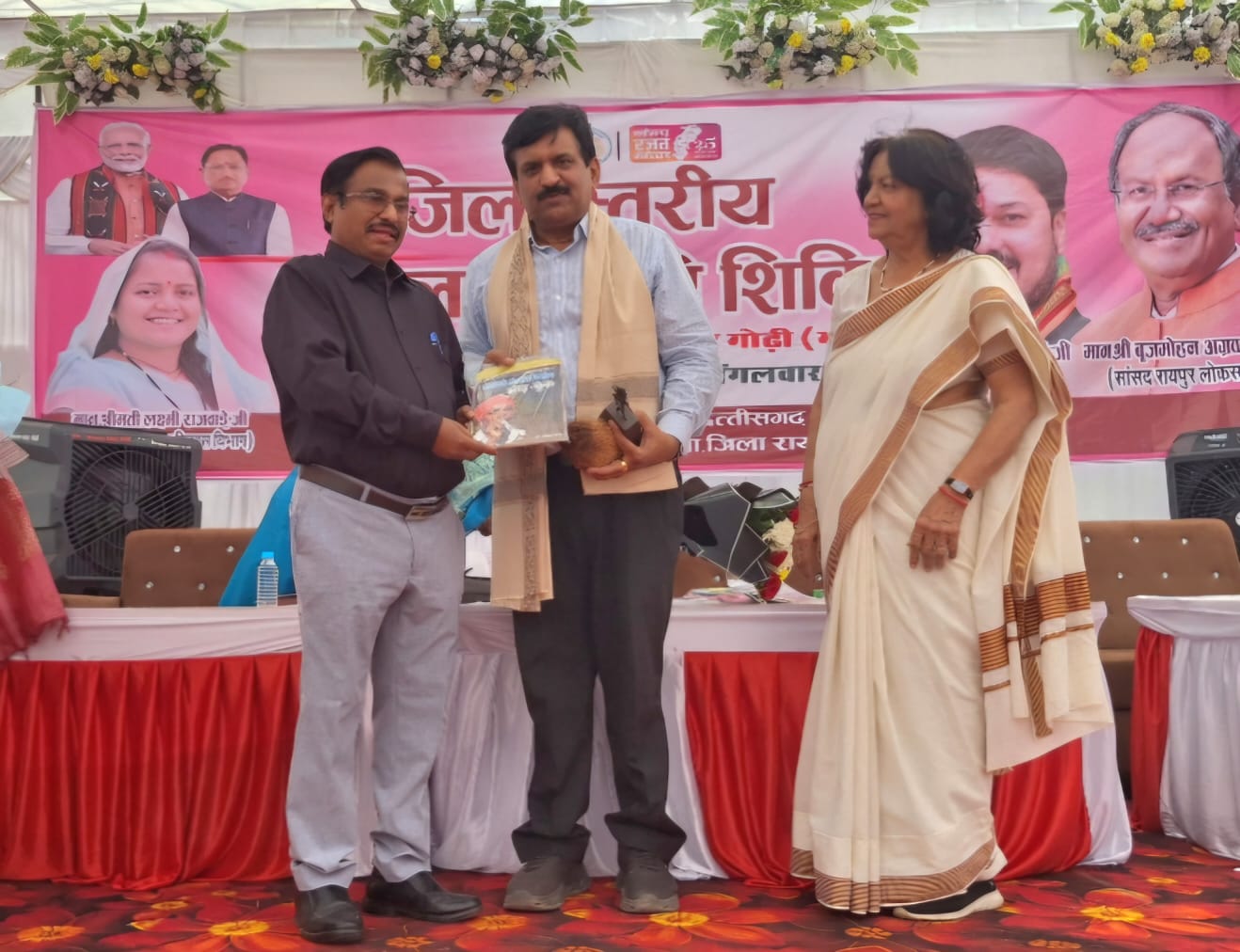 Women should remain aware of their rights.  Dr. Dinesh Mishra, Ophthalmologist and President of the Superstition Eradication Committee, delivering a lecture at the District Women's Awareness Camp, Raipur, Chhattisgarh,Khabargali