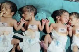 The woman gave birth to four children at once, a son and three daughters.